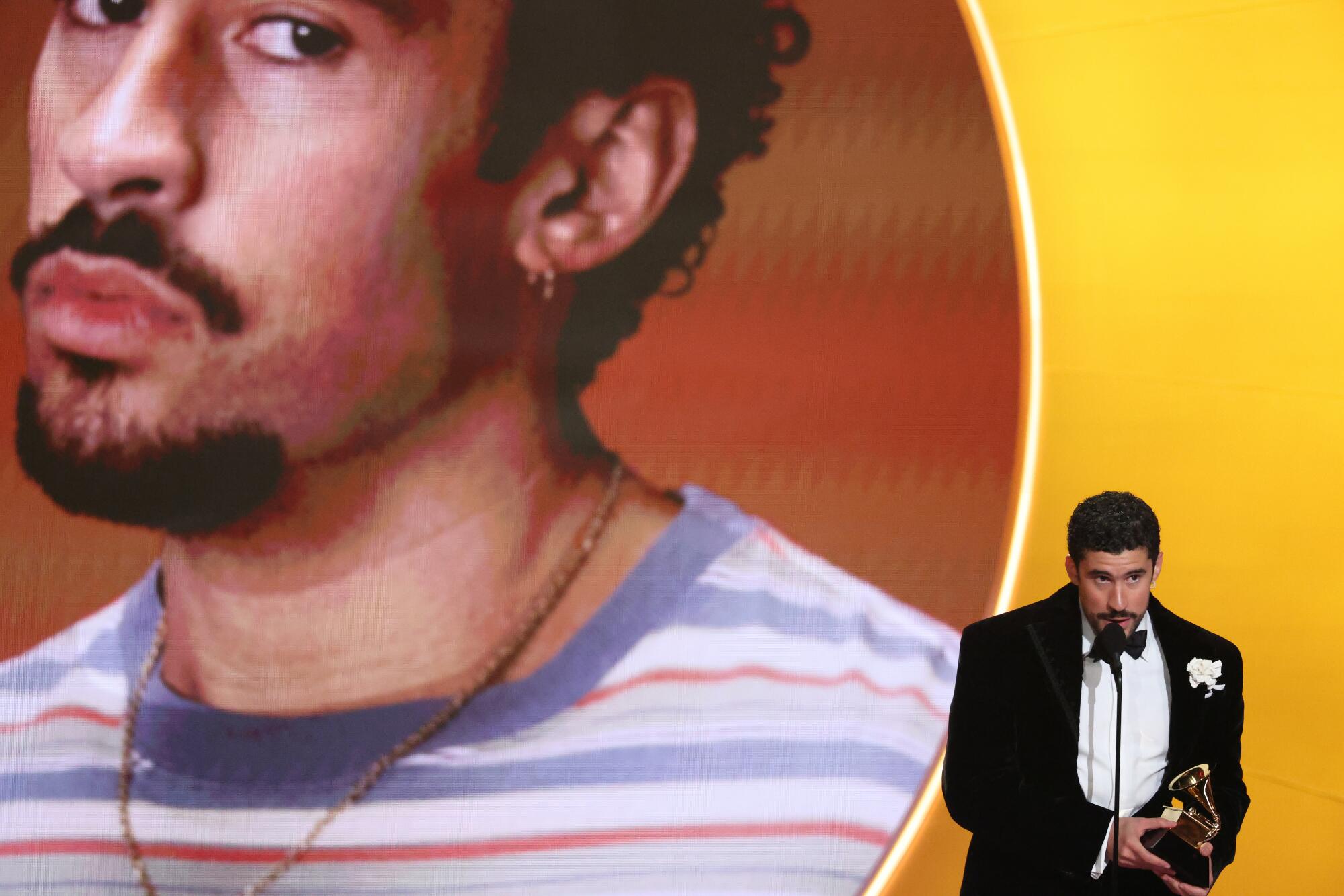 Bad Bunny speaks at the 68th Grammy Awards last Sunday.