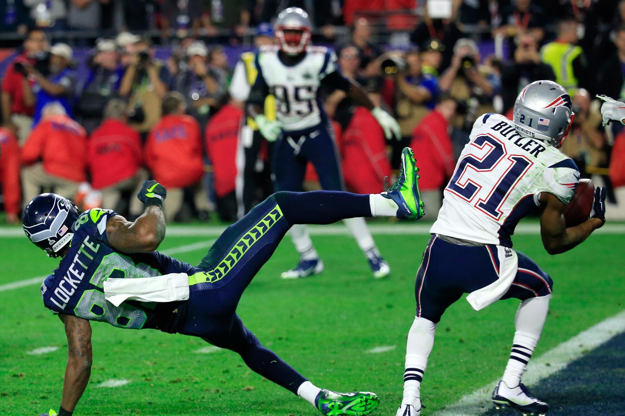 Patriots' Malcolm Butler intercepts intended for Seattle's Ricardo Lockette near the goal line. 