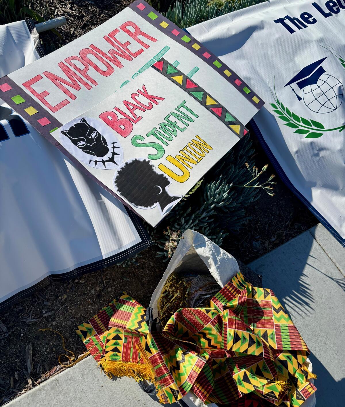 Signs created by the local Black Student Union members for the Orange County Black History Parade.