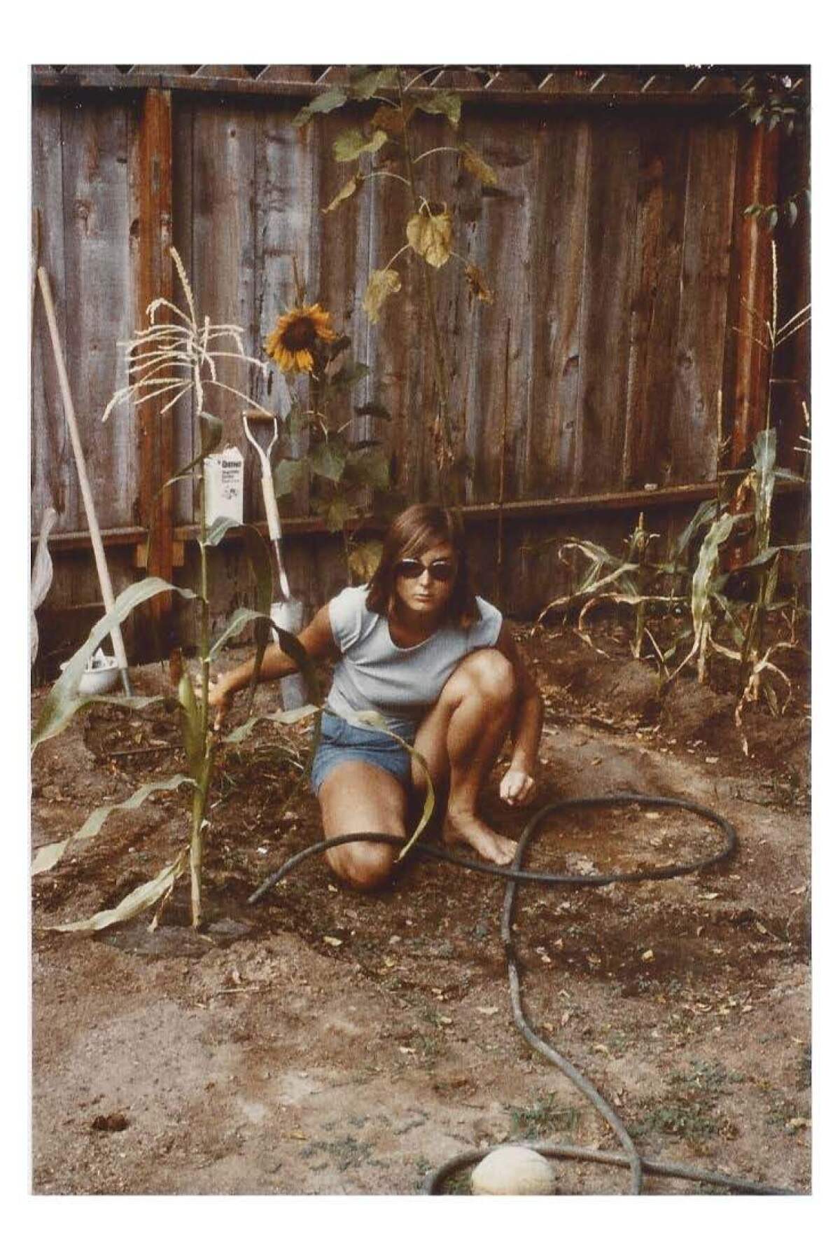 Jeanette Marantos, circa 1975, trying to grow her first garden