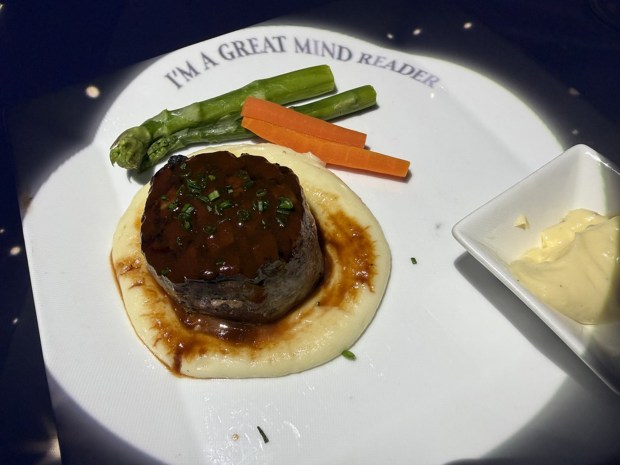 Magician's Circle: Steak Au Poivre: an Angus fillet mignon with pomme purée, glazed asparagus and a green pepper sauce. (Chris Riley/Times-Herald)