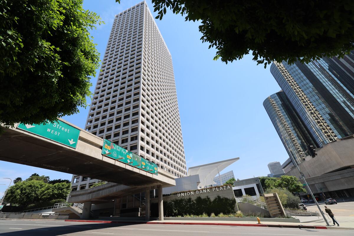 People walk through the Union Bank Plaza in downtown Los Angeles.