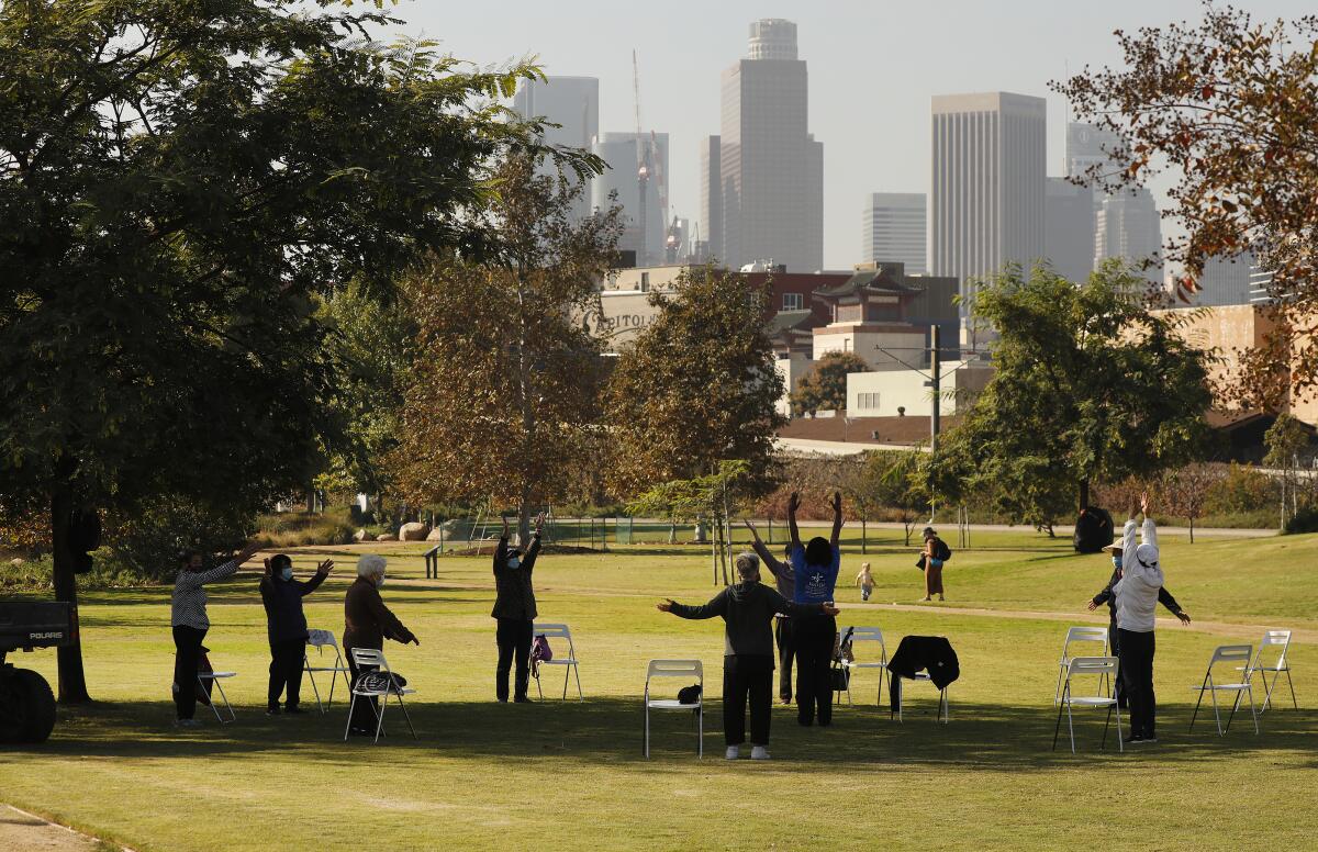 Sipoo Shelene Hearring leads seniors in a Yang Style tai chi class at Los Angeles State Historic Park 