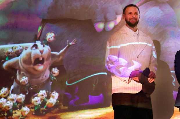 Golden State Warriors star Steph Curry is introduced before the screening of "GOAT" at the Grand Lake Theater in Oakland, Calif., on Tuesday, Feb. 10, 2026. The film, "GOAT," a story about a young goat trying to make his way into professional sports, was produced by Curry. (Ray Chavez/Bay Area News Group)