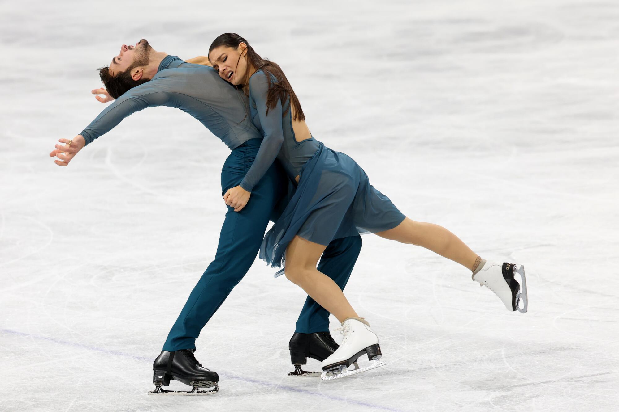 France's Laurence Fournier Beaudry and Guillaume Cizeron compete in the ice dance final at the Winter Olympics.