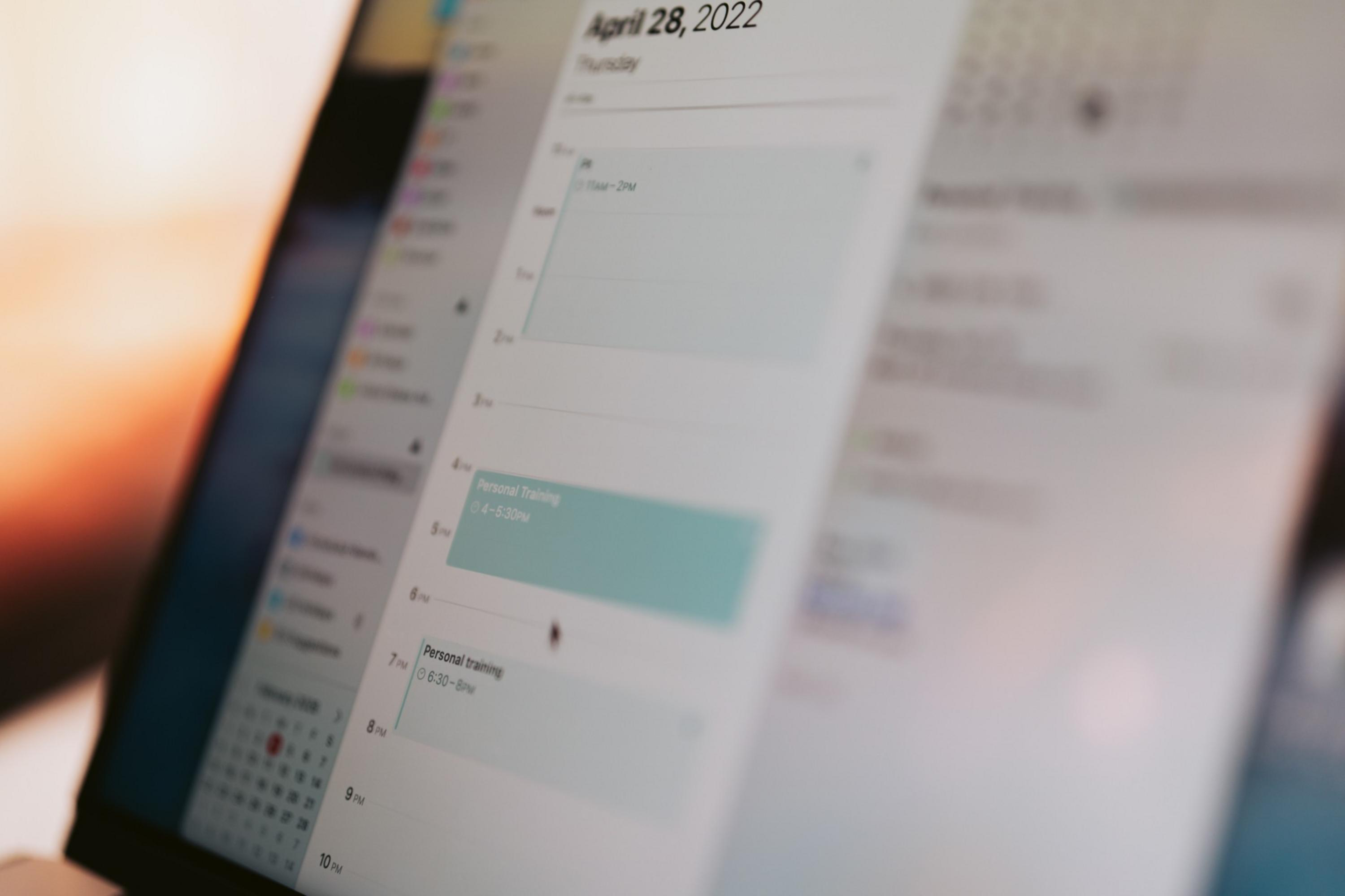 A digital calendar displays appointments for April 28, 2022, including personal training sessions scheduled from 5 to 5:30 pm and 6:30 to 8 pm.