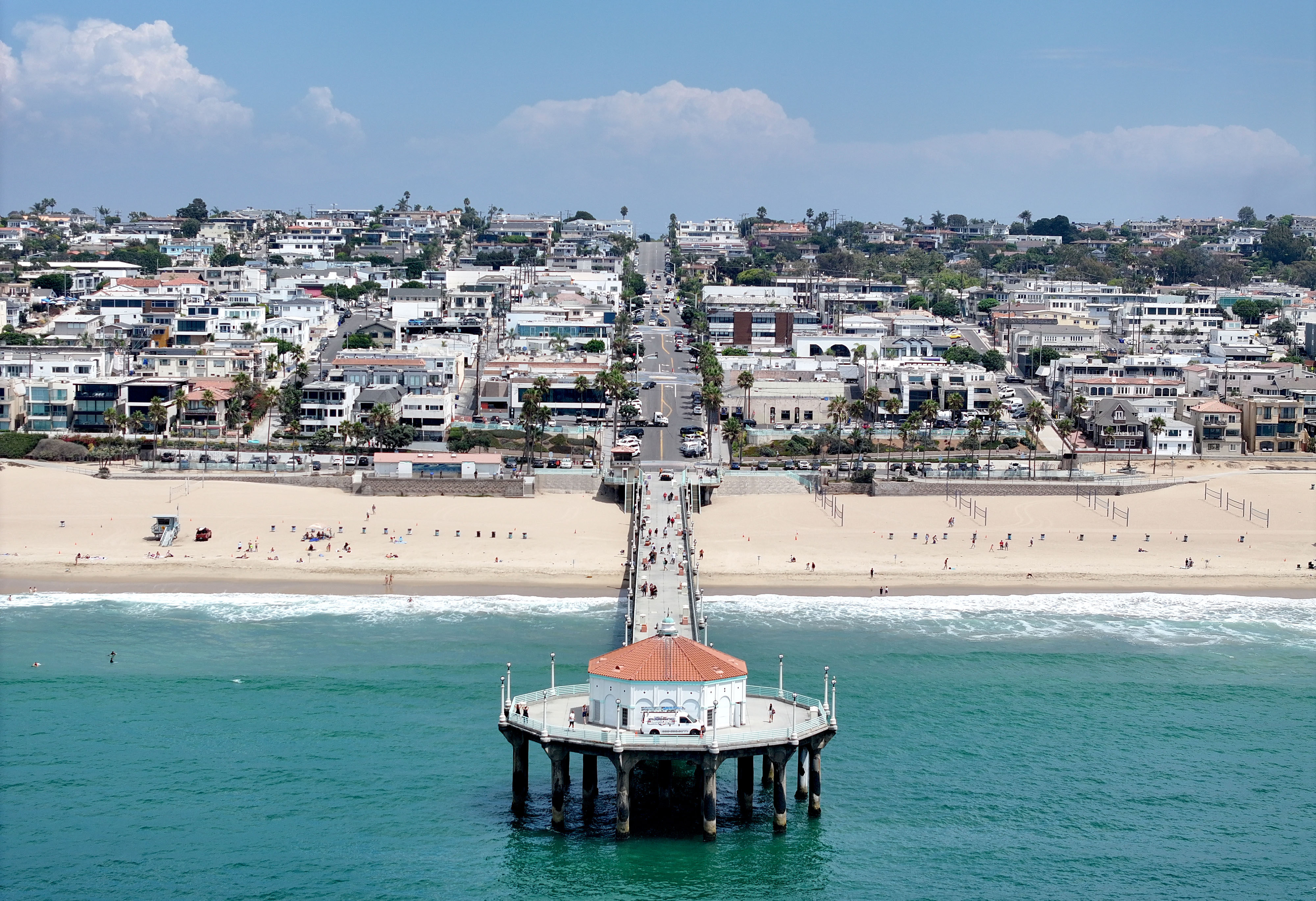 Manhattan Beach Pier on a warm and sunny afternoon just...