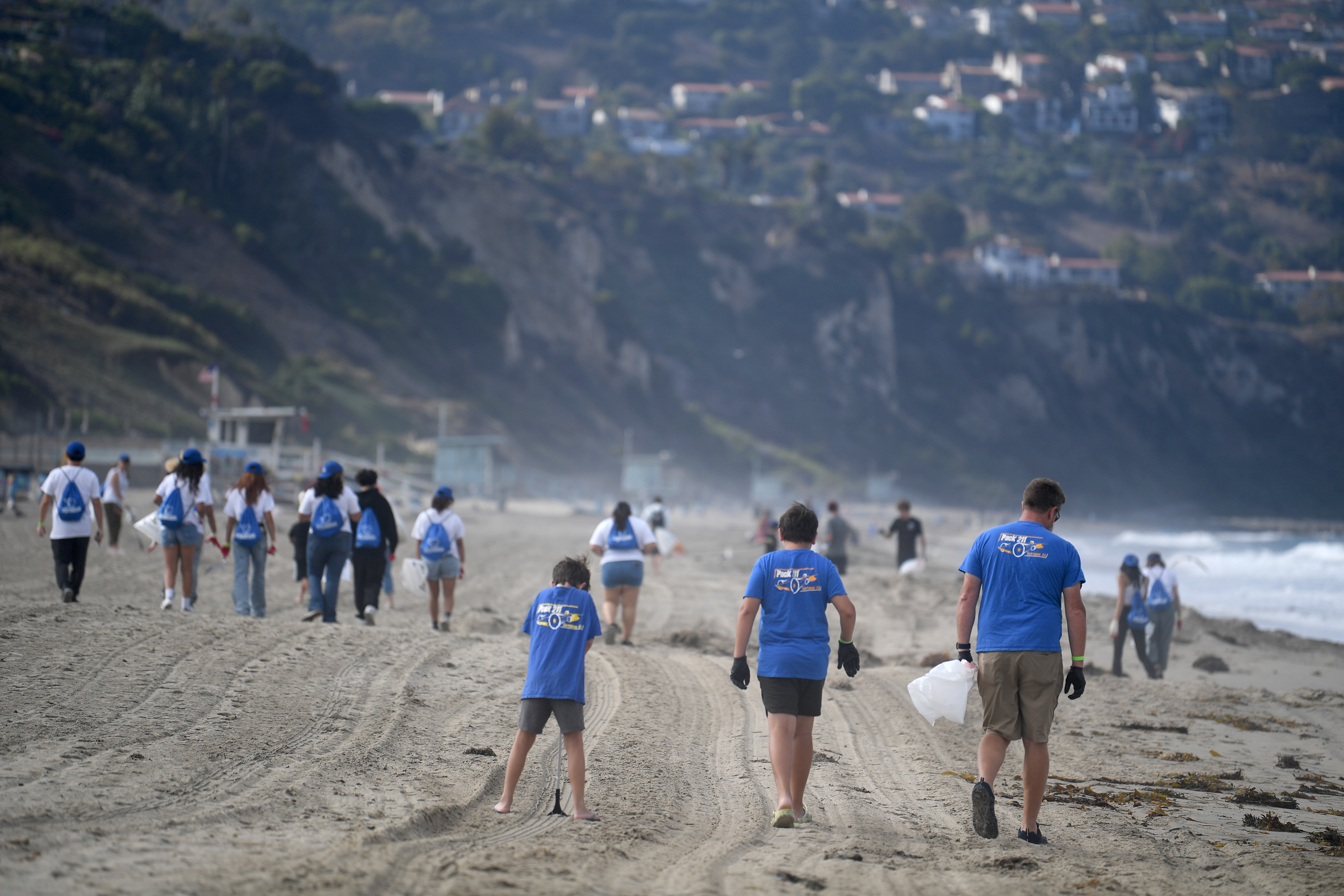John Williams and his sons Robert, 10, and Joshua, 8,...