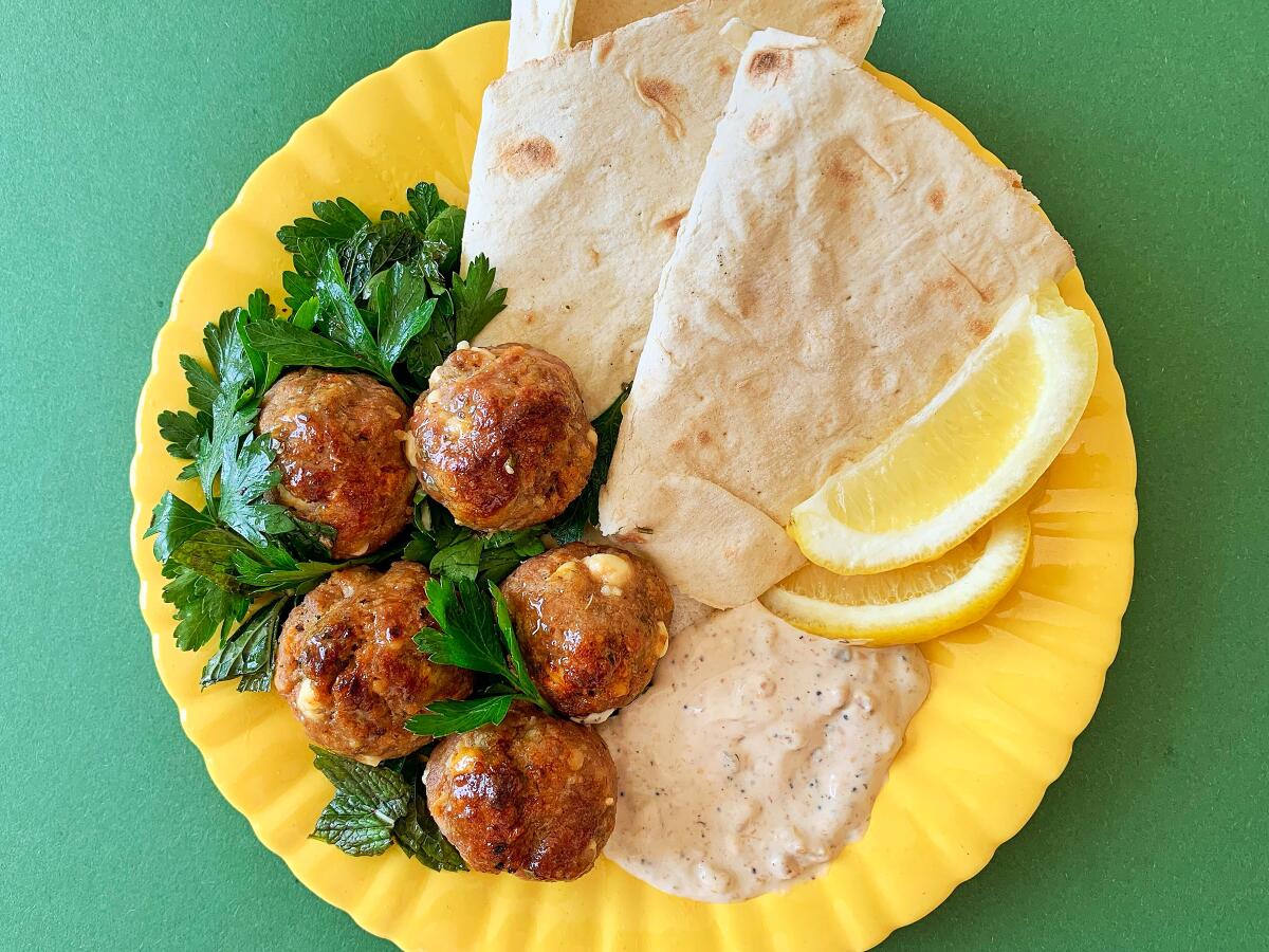 Caramelized lemon turkey meatballs on a plate.