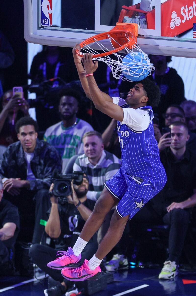 Magic guard Jase Richardson completes a reverse dunk during NBA All-Star dunk contest Saturday at the Intuit Dome.