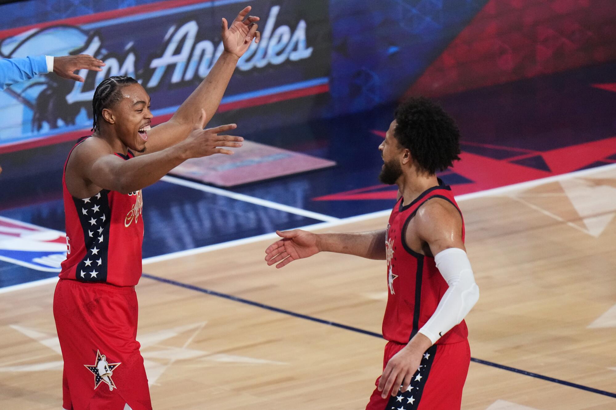 USA Stars forward Scottie Barnes celebrates with Cade Cunningham hitting a game-winner in the first all-star matchup.