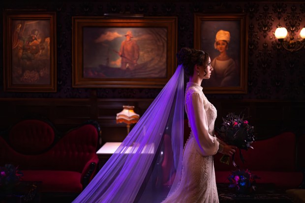 Disney's Fairy Tale Weddings and Honeymoons will offer ceremonies in the Haunted Mansion Parlor cocktail lounge aboard the Disney Destiny cruise ship. (Courtesy of Disney)