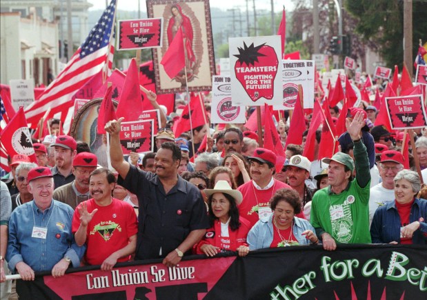 Leading the pack of thousands of United Farm Workers supporters Sunday, April 13, 1997 in Watsonville, Calif. are, left to right, AFL-CIO President John Sweeney, UFW President Arturo Rodriguez, The Rev. Jesse Jackson, UFW Secretary-Treasurer Dolores Huerta and AFL-CIO Executive Vice President Linda Chavez-Thompson. (AP Photo/Sam Morris)
