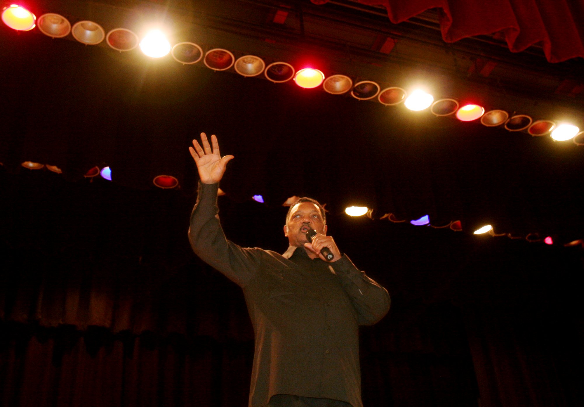 Rev. Jesse Jackson speaks to students at McClymonds High School...