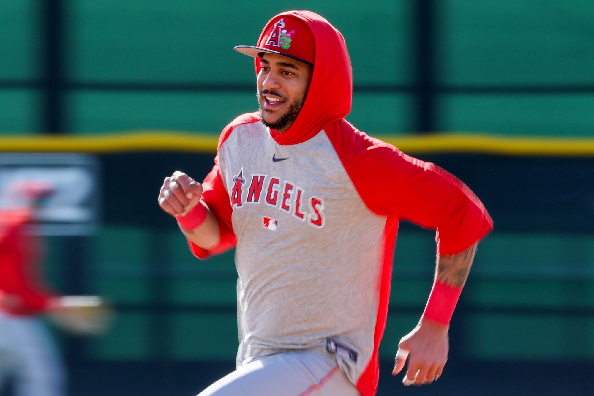 Oswald Peraza rounds the bases for a practice drill.
