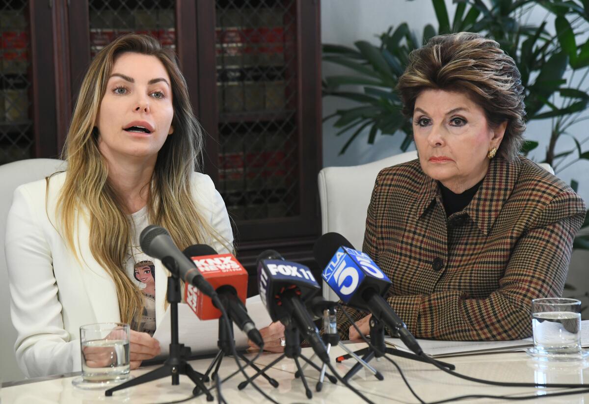 Crystal Hefner and attorney Gloria Allred at a news conference Tuesday in Los Angeles.