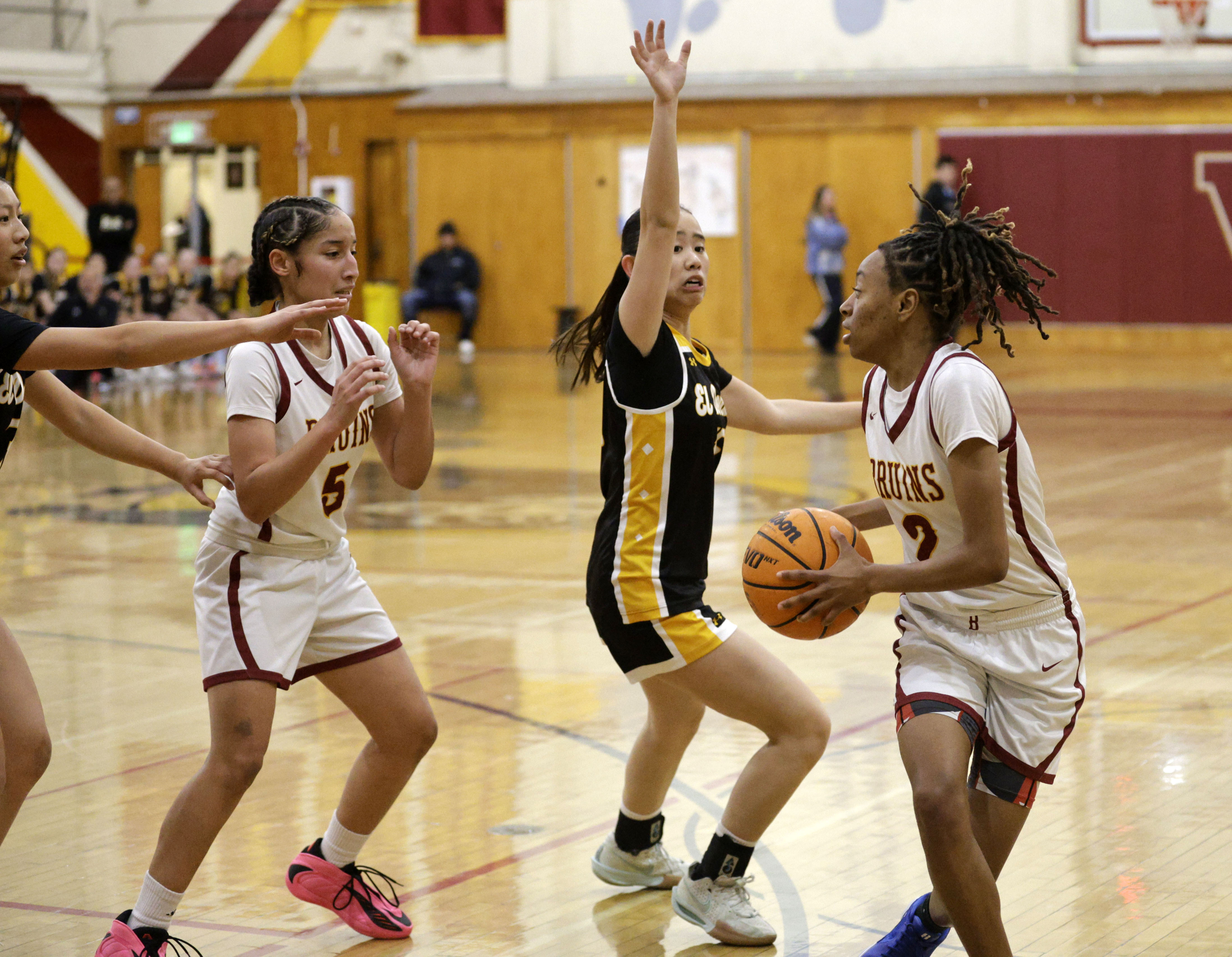 El Dorado’s Delaney Shiring (12) tries to block Wilson’s Kennedy...
