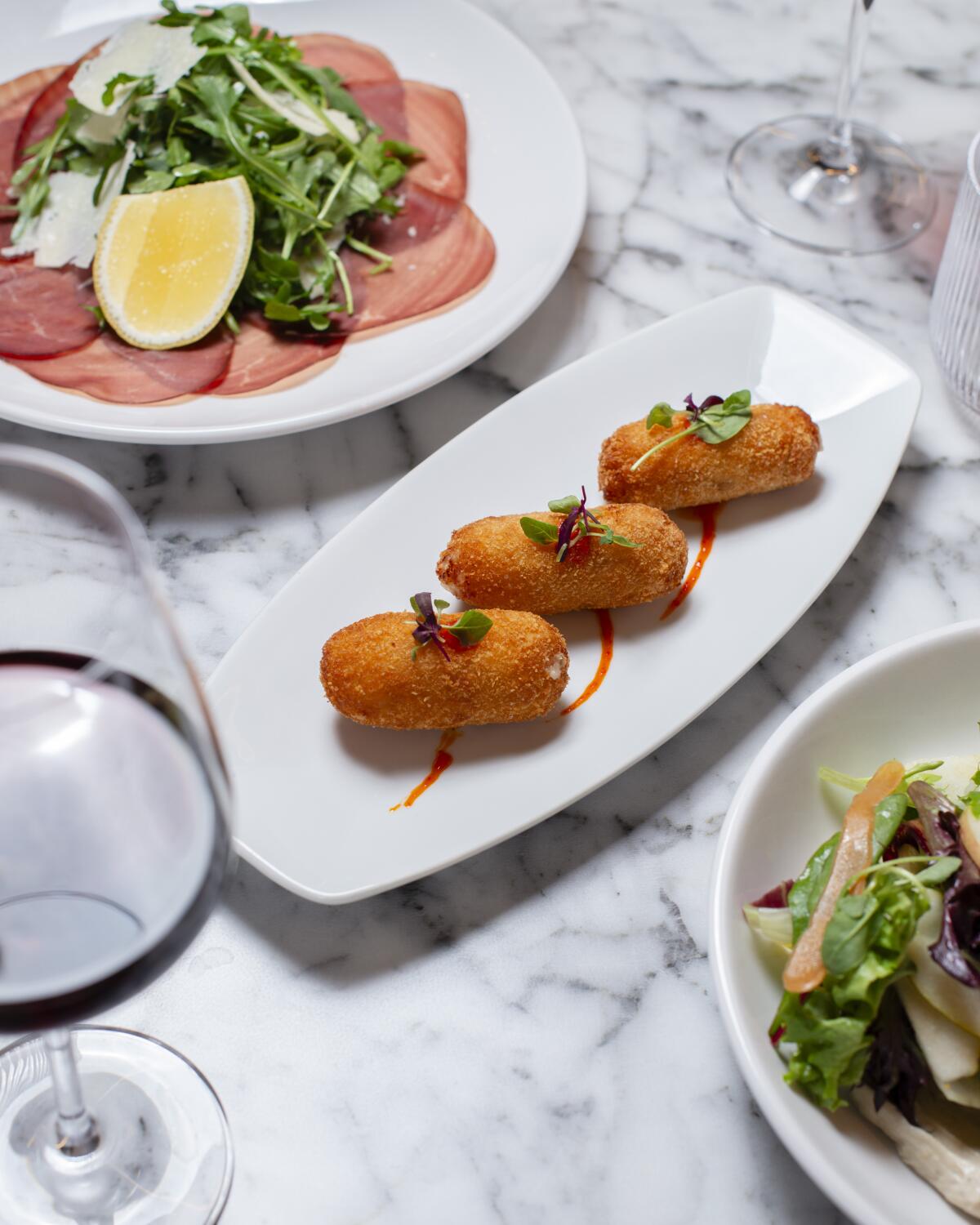 CasaDami's croquetas are on the Golden Hour menu, which features a selection of tapas.