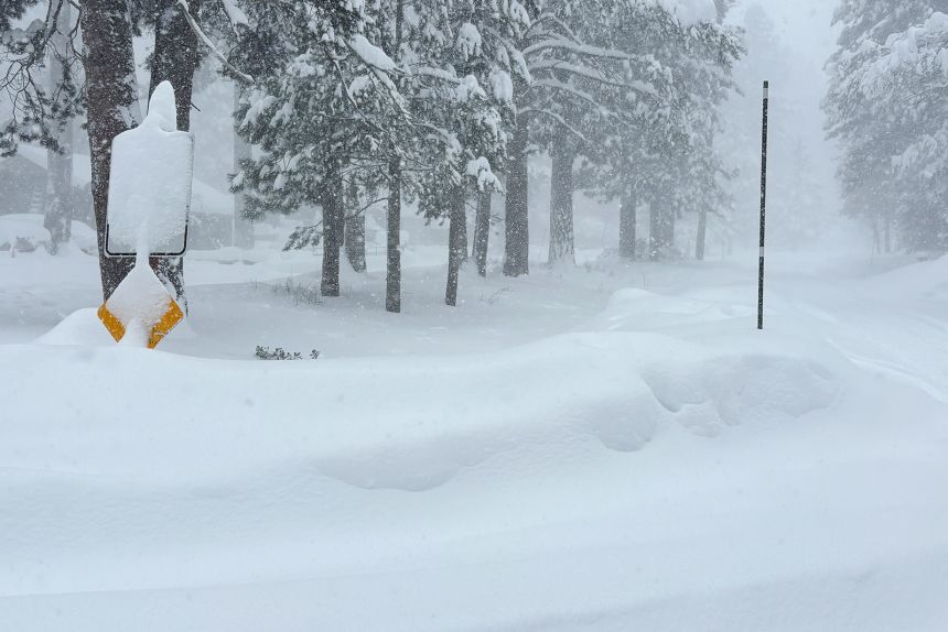 Snow falls Tuesday in Truckee, California. Crews were looking for multiple backcountry skiers feared missing after a reported avalanche.