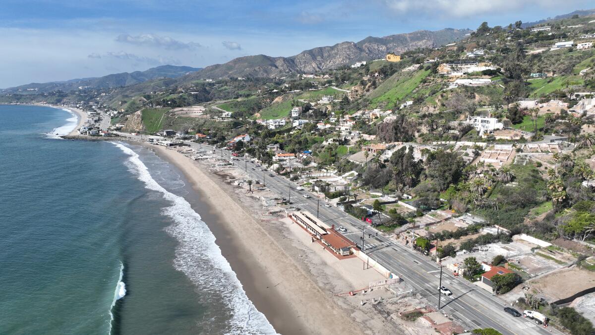 Aerial image of an oceanfront neighborhood and hillside neighborhood in Malibu