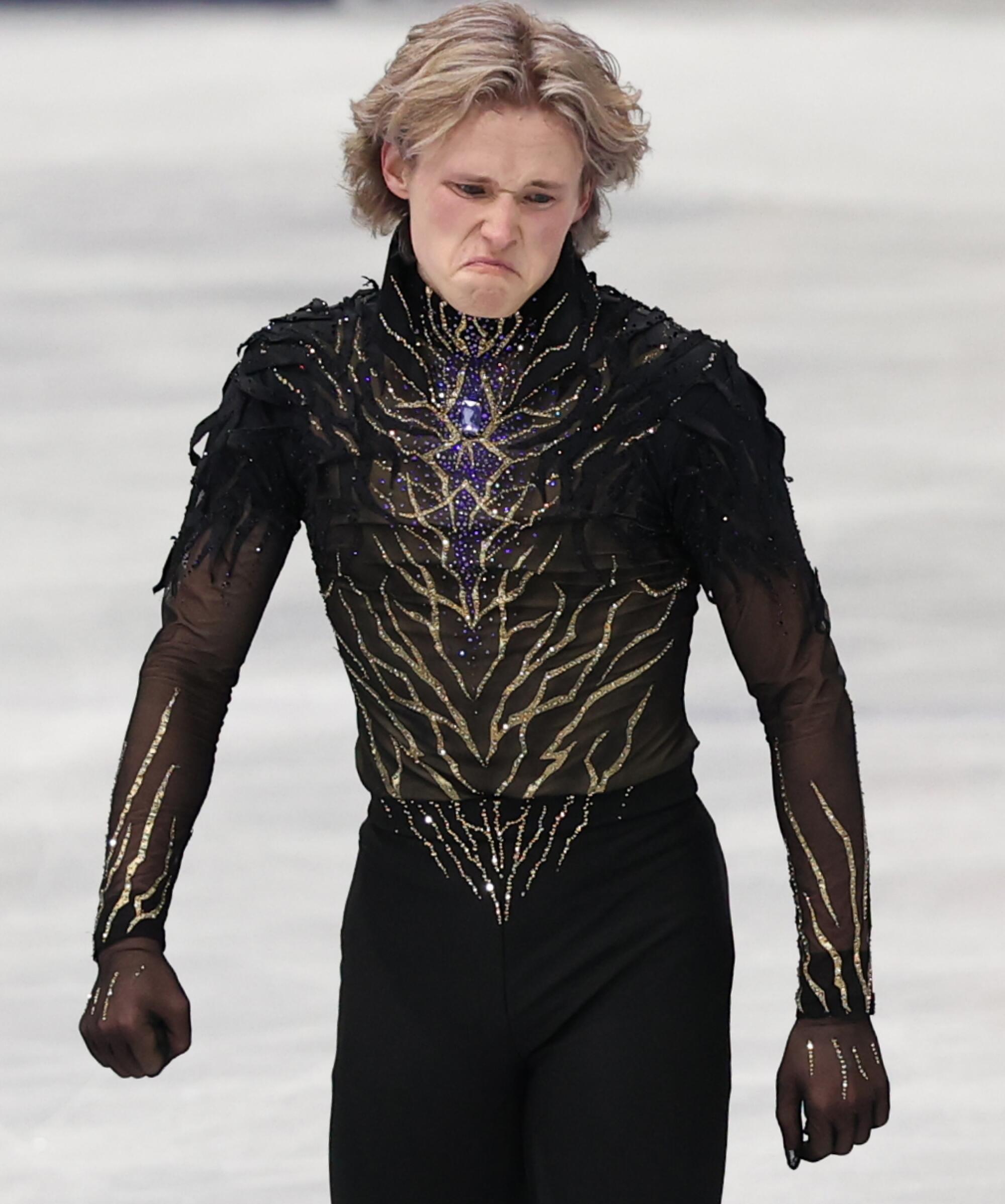 Ilia Malinin feels the pain of a bad performance during the Finals for Men's Single Skating at Milano Ice Skating Arena.