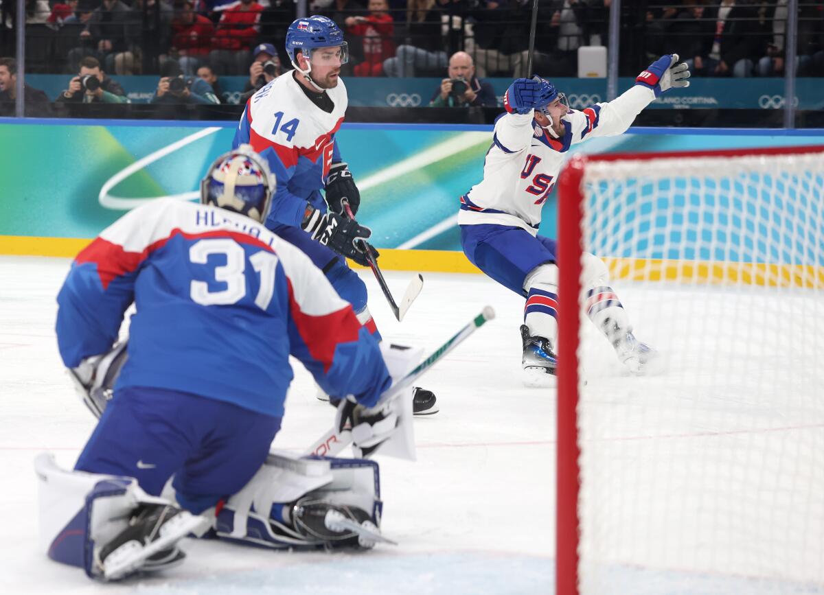 American Dylan Larkin, right, celebrates after scoring in the first period against Slovakia on Friday.