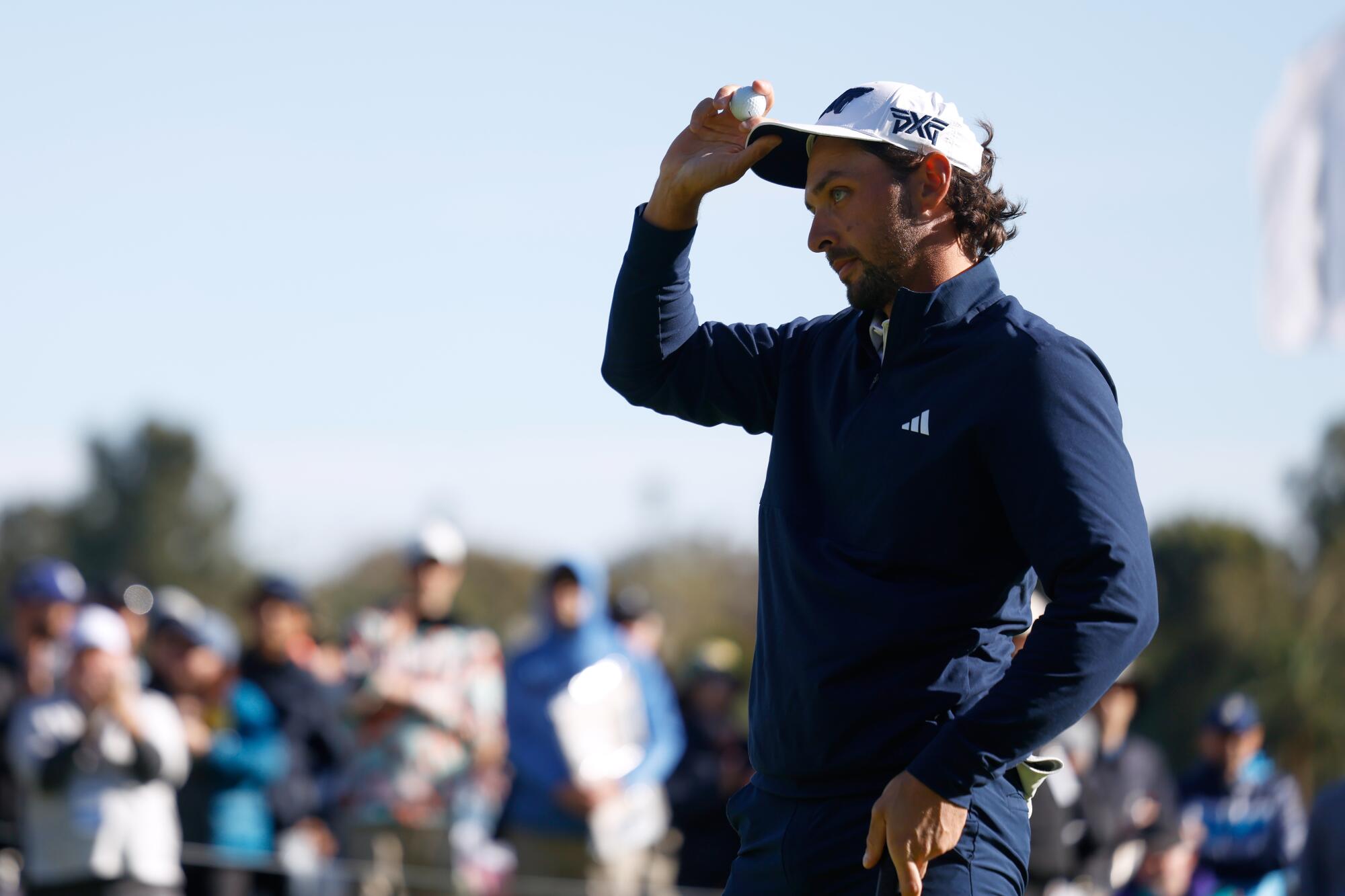 Marco Penge reacts after putting on the 18th green during the second round of the Genesis Invitational.