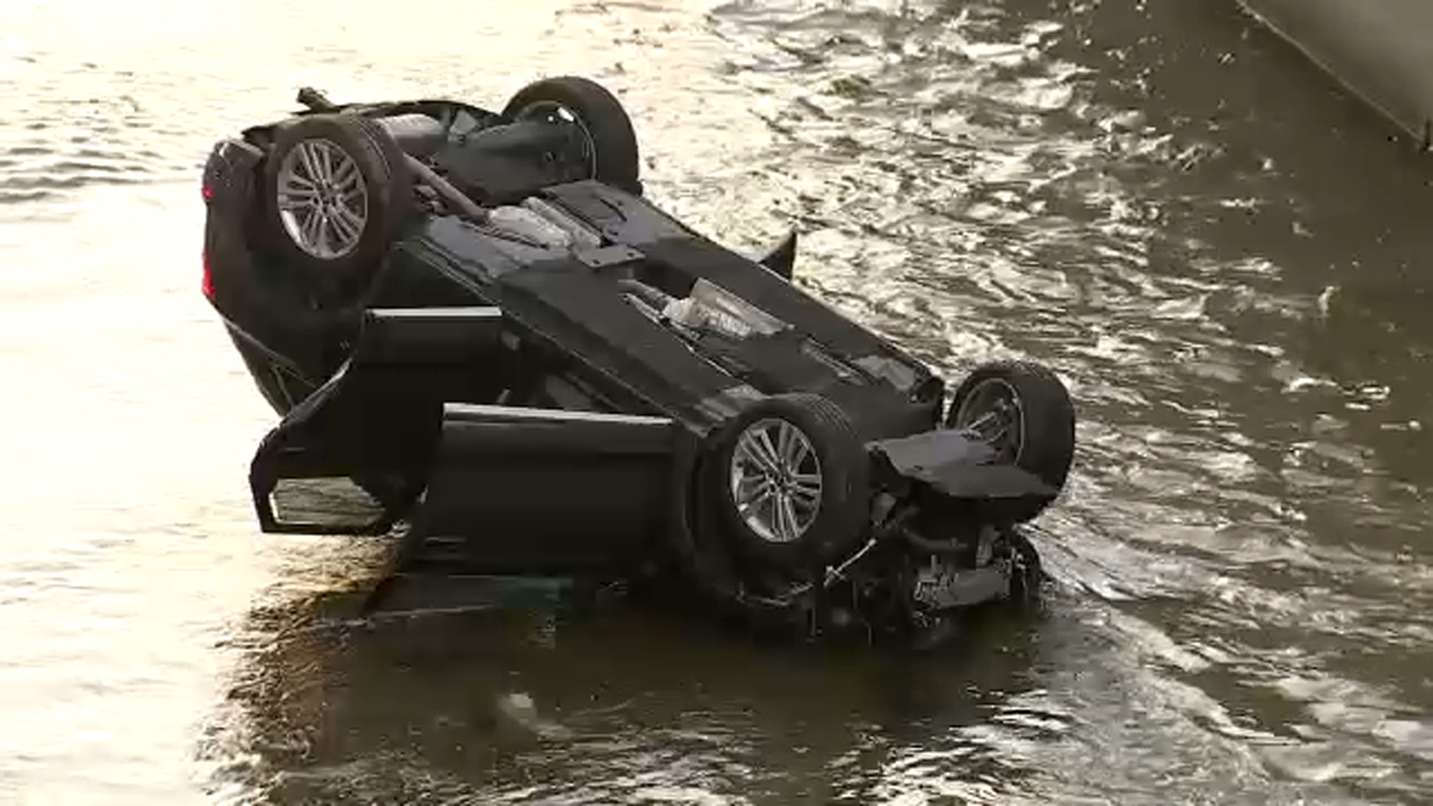 Man rescued from LA River after SUV crashes, overturns in Valley Village, firefighters say
