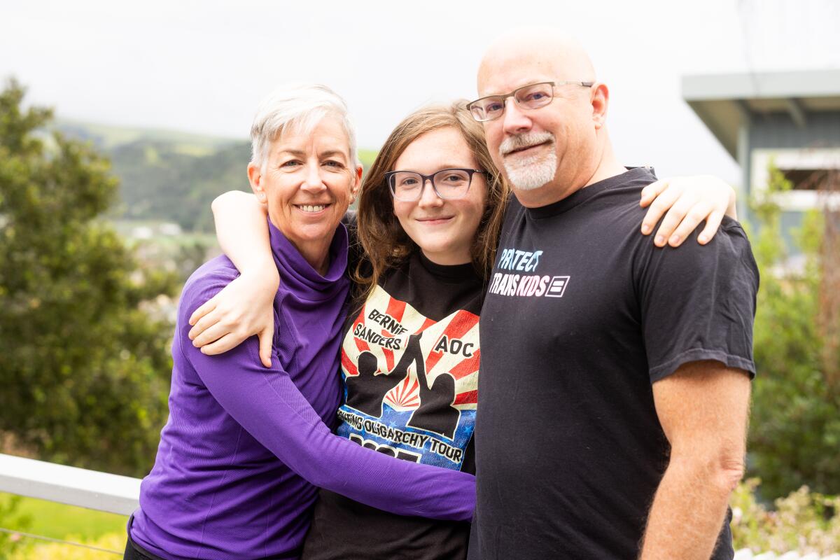 Lily Norcross with her parents, Trevor and Hilary Norcross.