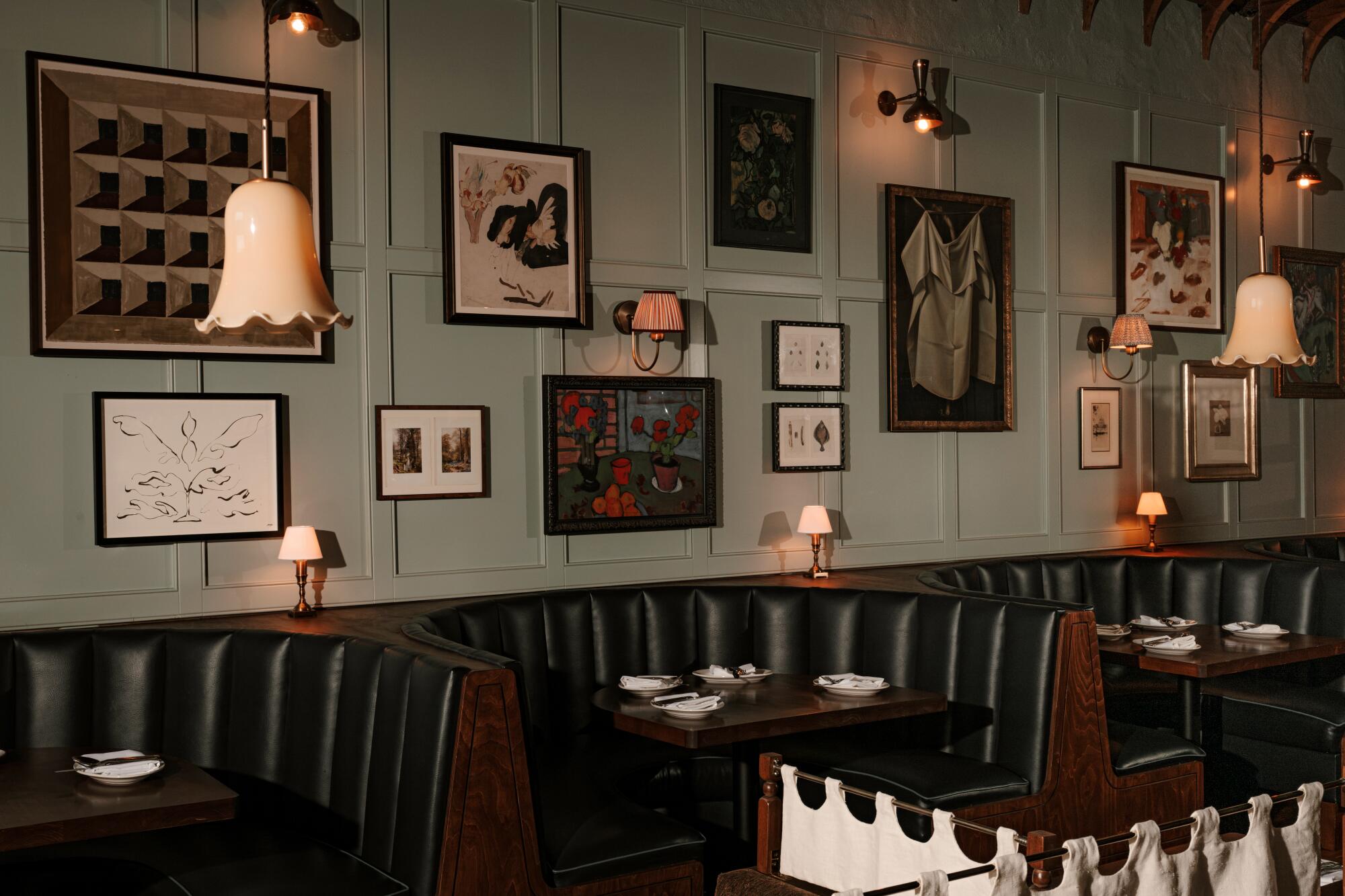  A view of the booths along the back wall of the dining room before service at Hermon's in Los Angeles .