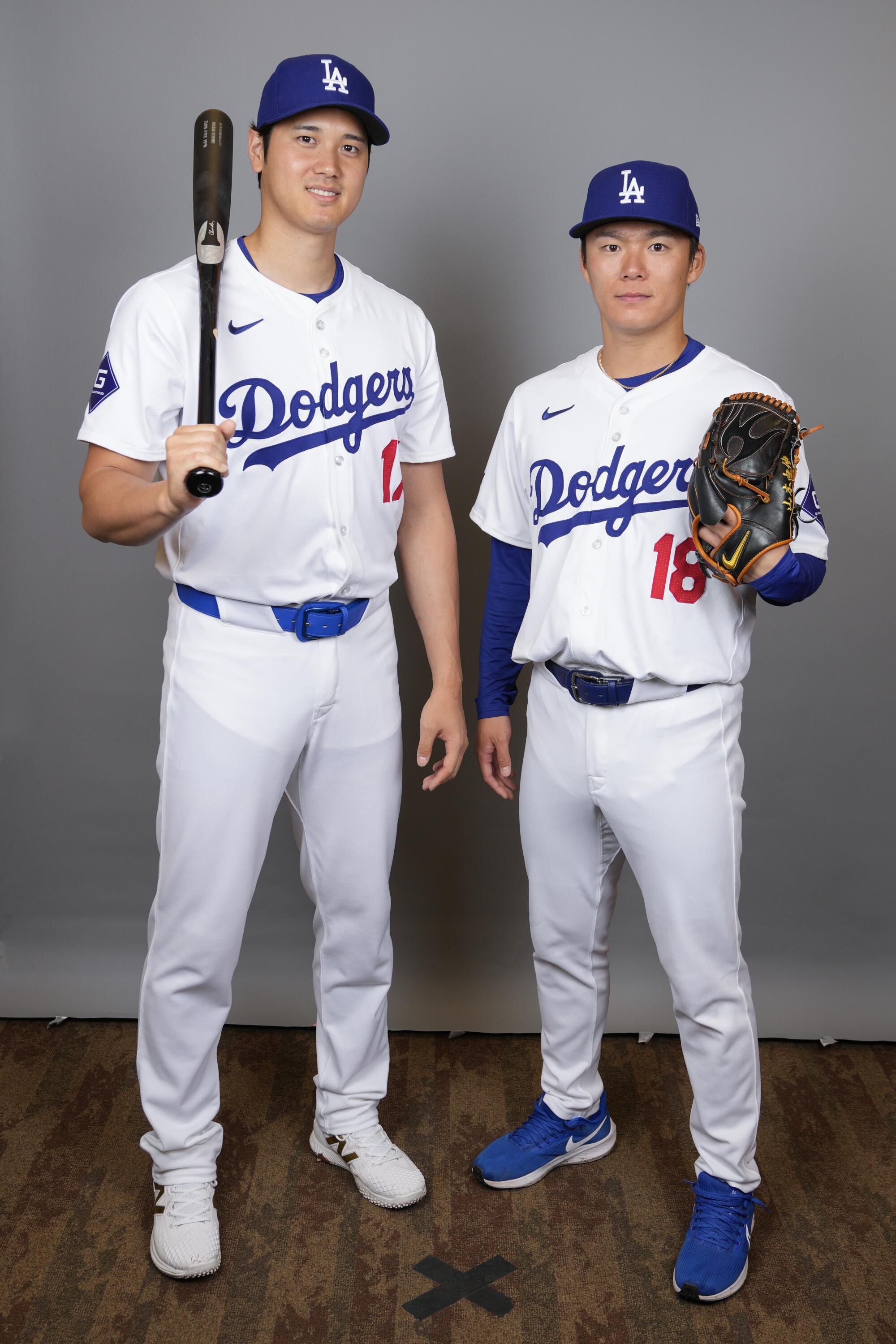 Dodgers stars Shohei Ohtani and Yoshinobu Yamamoto pose for a photo that highlighted sheer uniforms on Feb. 21.