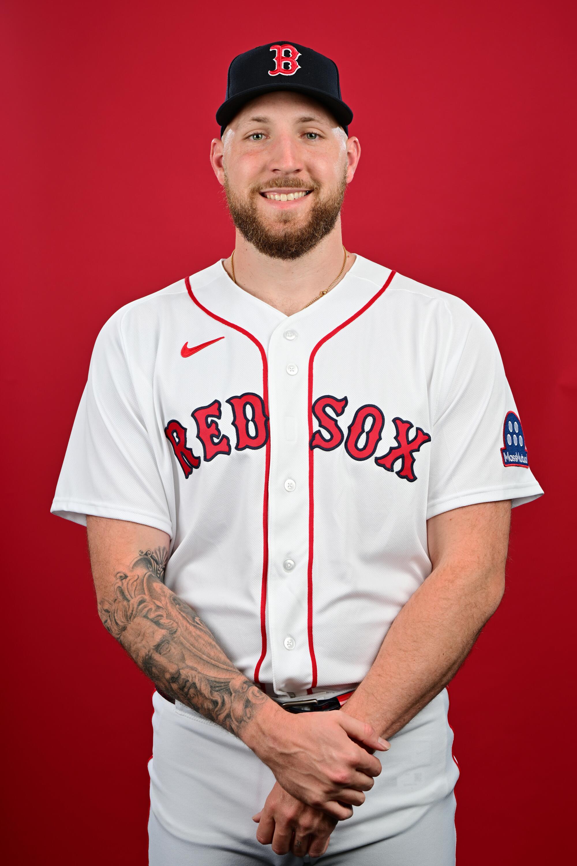 Boston pitcher Garrett Crochet's jersey features the Red Sox logo running into red piping on his uniform.