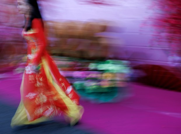 Dieu Vo of Milpitas attends the Tet Festival 2026 at Eastridge Center Friday, Feb. 20, 2026, in San Jose, Calif. The three-day festival includes live music and entertainment, lion dancers, a fashion show and carnival rides, as well as retail, food and drink vendors. (Dai Sugano/Bay Area News Group)