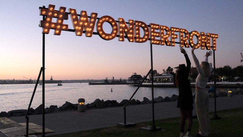 Wonderfront Attendees enjoy scenery on the downtown waterfront. Photo by Chris Stone