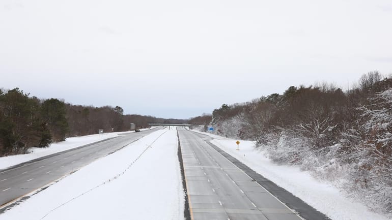 A deserted Long Island Expressway at Exit 70, County Road...