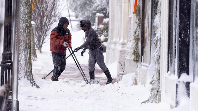 With winds still kicking and snow still falling from the...