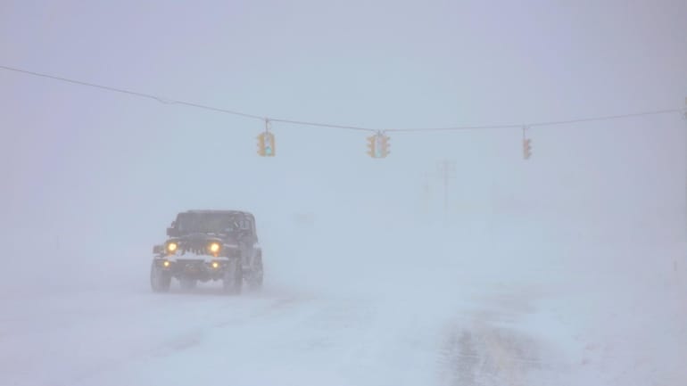 Whiteout conditions along Northville Turnpike in Aquebogue on Monday.