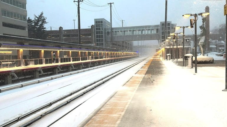 The LIRR station in Mineola is empty as service is...