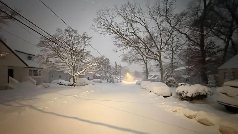 Roads in Huntington appeared to be untouched by plows around...