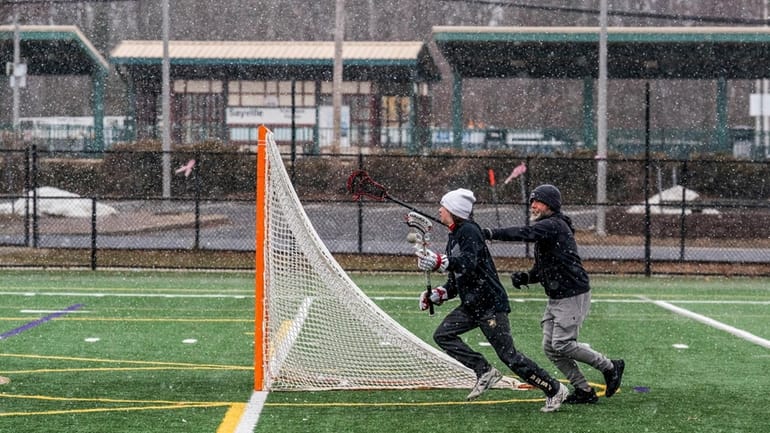 Tom Norman III and his son, Tom Norman IV, of...