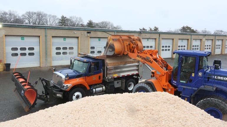 A truck in Hicksville prepares to respond to the storm.