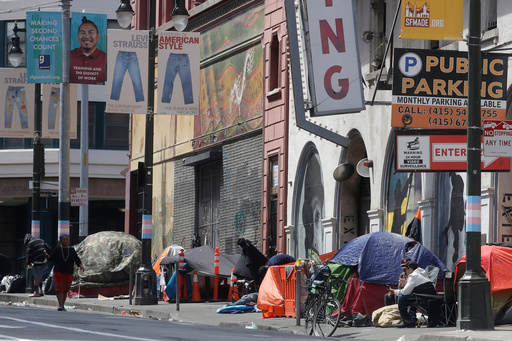 FILE - Tents line a sidewalk on Golden Gate Avenue in San Francisco, April 18, 2020. (AP Photo/Jeff Chiu, File)