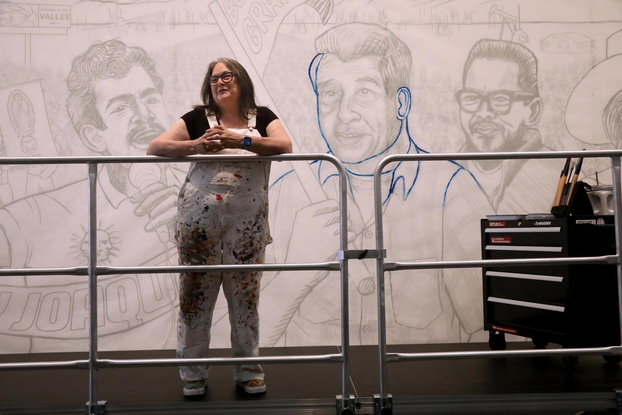 Artist Judy Baca stands by an in-progress section of "The Great Wall of Los Angeles."