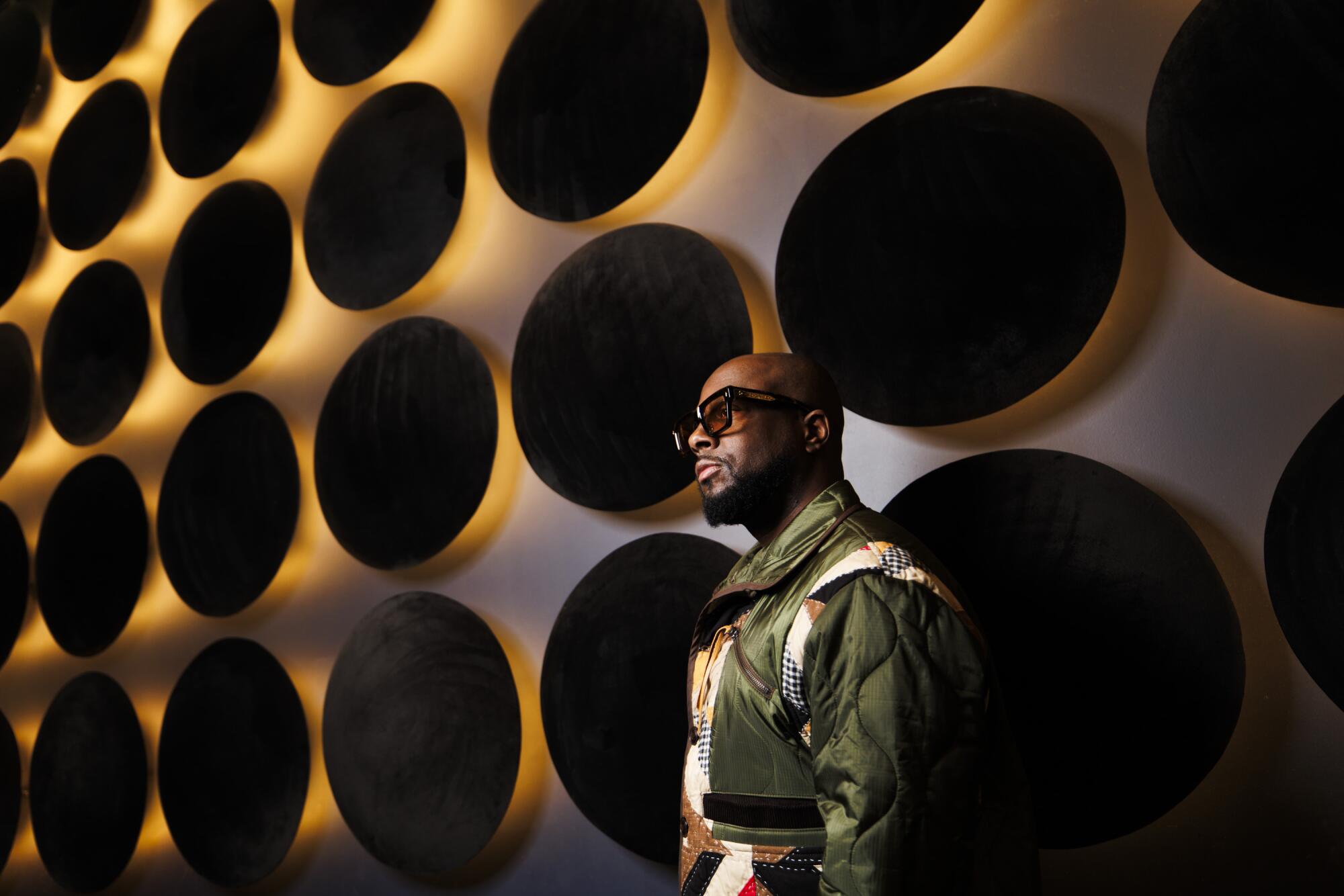 Wyclef Jean sits inside the Blue Note LA