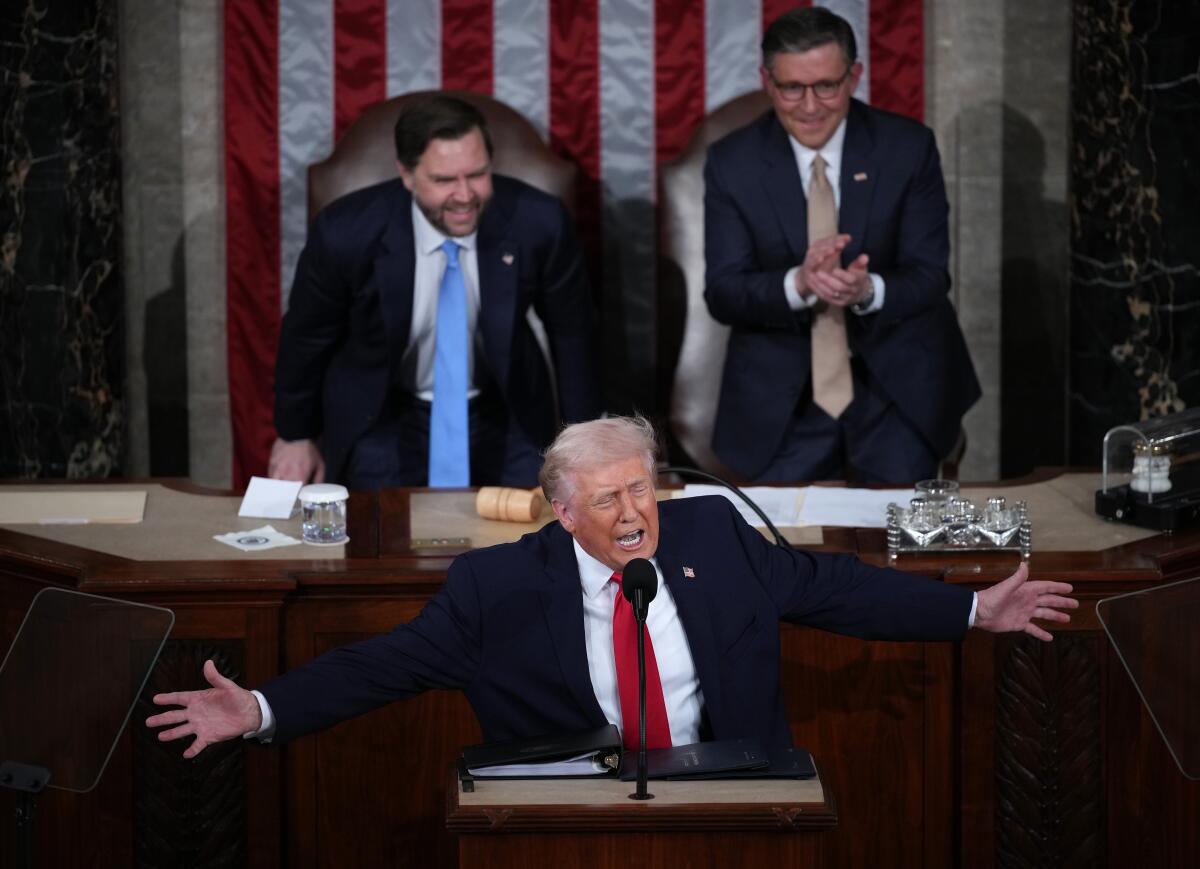 President Donald Trump delivers his State of the Union address with the vice president and speaker of the house behind him