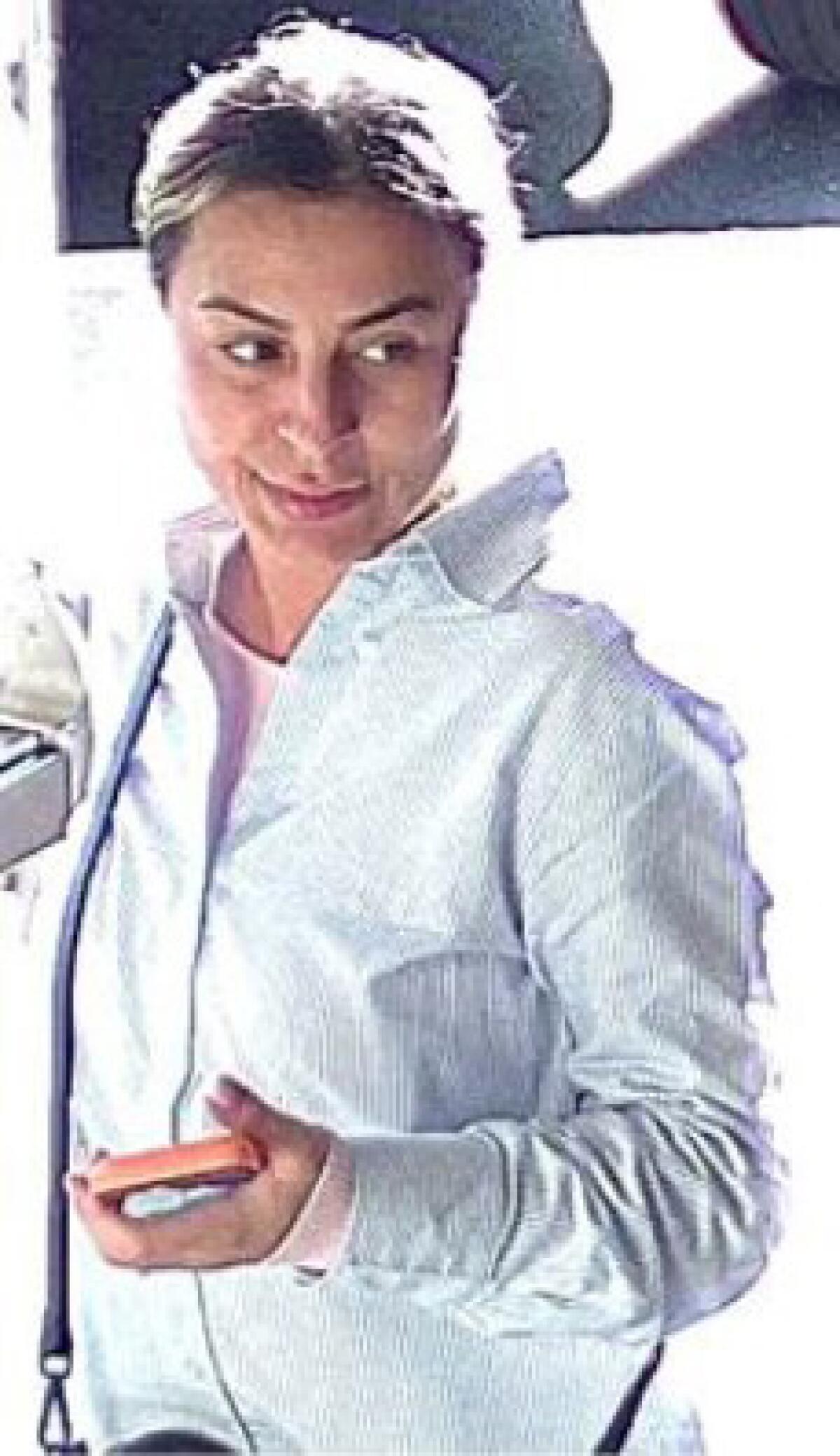 A woman in a white shirt