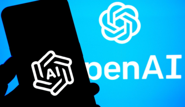 A smartphone screen displays the white OpenAI logo with "AI" inside, against a blue background showing the full OpenAI logo and partial text.