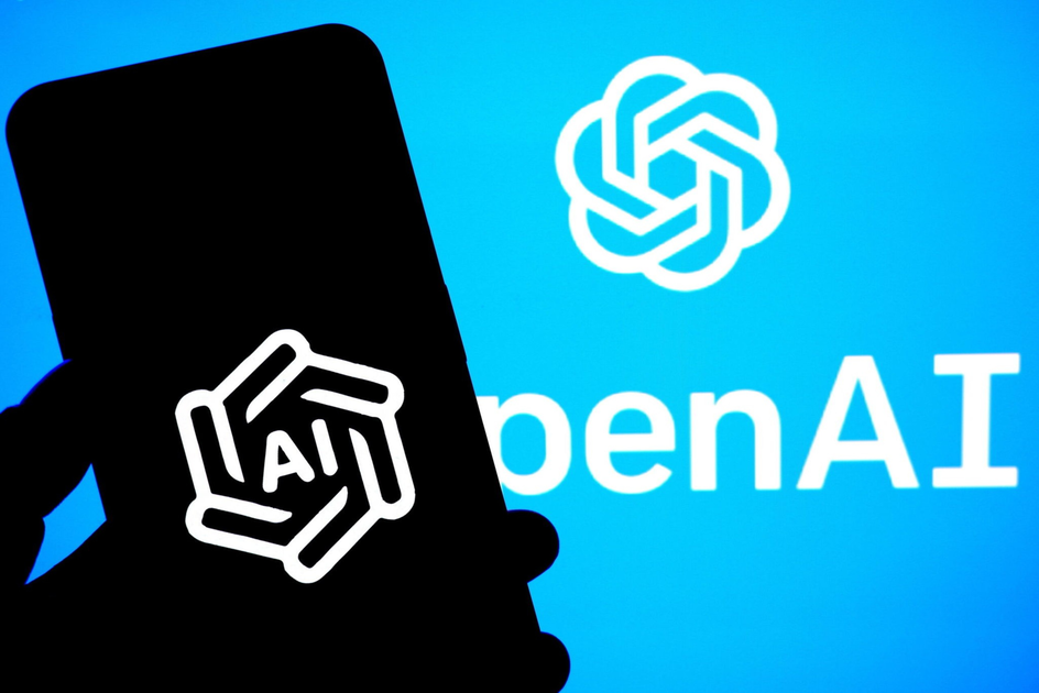 A smartphone screen displays the white OpenAI logo with "AI" inside, against a blue background showing the full OpenAI logo and partial text.