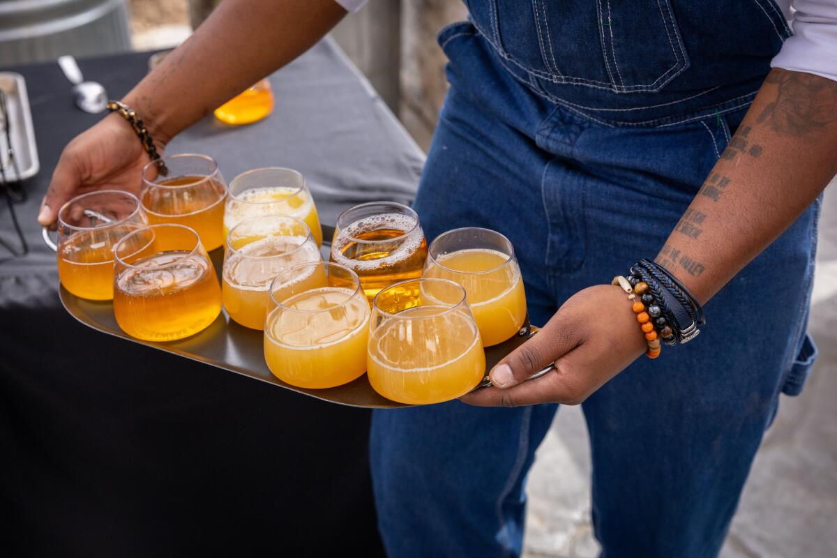 Acton, CA - February 15: Beverages are served at Sunday jazz brunch at Bloom Ranch, a 250-acre Black-owned farm and ranch on the edge of L.A. County on Sunday, Feb. 15, 2026 in Acton, CA. (Jason Armond / Los Angeles Times)