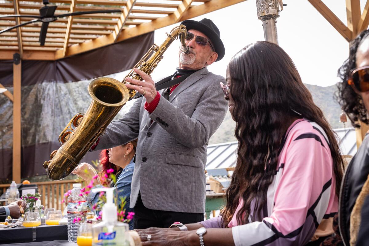 Herbie Kae on the saxaphone.